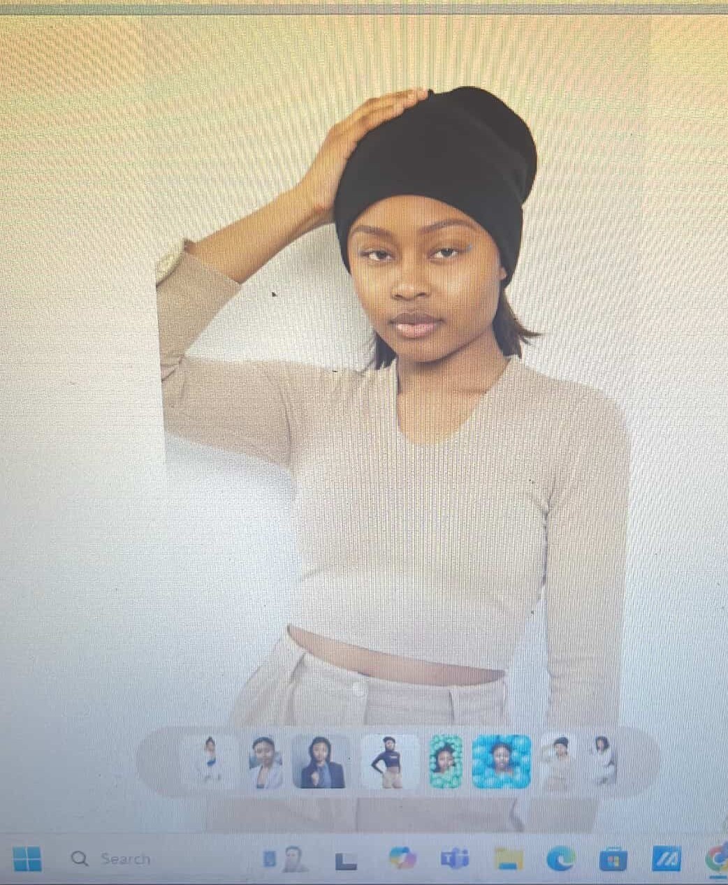 Fatimah using AI systems on her laptop